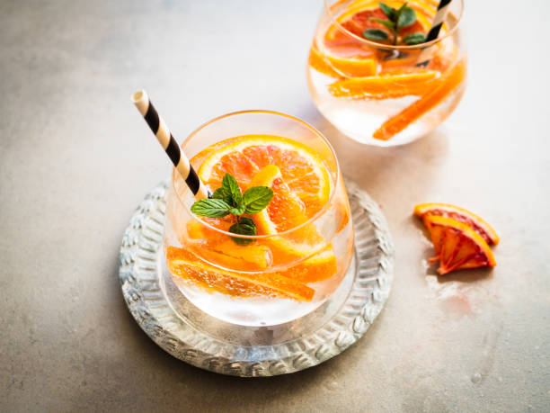 istock Drink with fresh blood oranges and peppermint in a glass 1205264861
