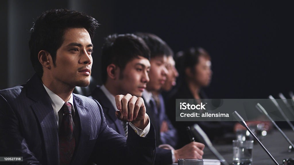 Uomo d'affari nella riunione - Foto stock royalty-free di Riunione