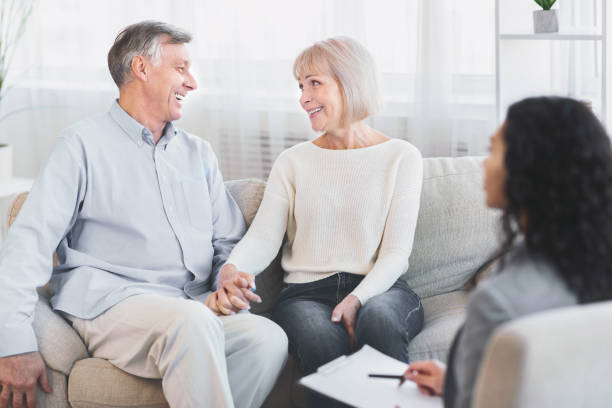 istock Happy elderly couple hugging after successful therapy 1205273456