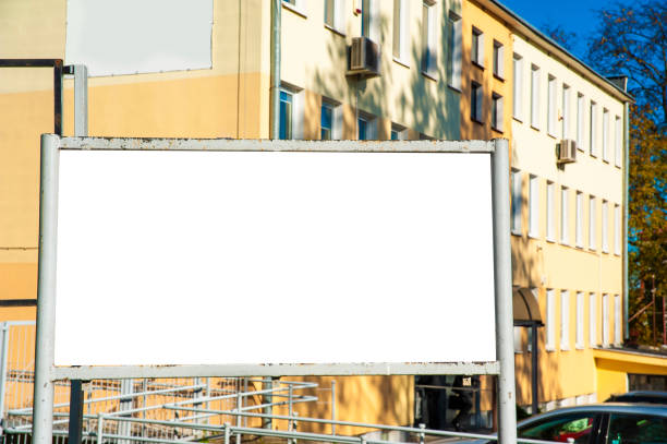 istock Blank white banner for advertisement in the front of the building 1205274204