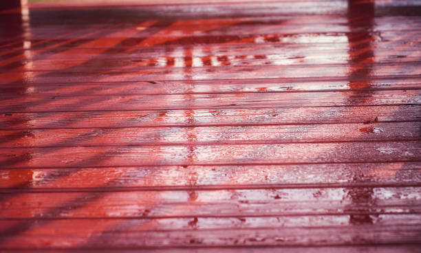 istock water beads on the  red cedar wood deck after a spring rain 1205276725