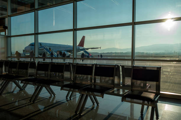 istock Airport waiting room, plane 1205277982