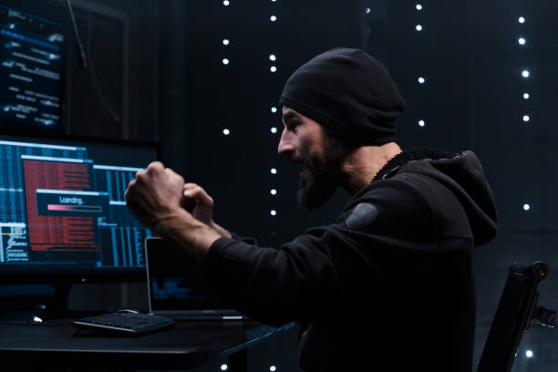 istock Jubilant male hacker celebrates his victory. 1205278163