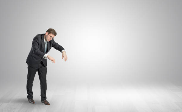 istock Zombi businessman walking in a copy space 1205279642