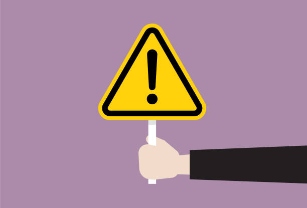 The human hand holds a exclamation sign Warning sign, Danger, Alertness, Mistake, Hazard Sign, Safety beware sign stock illustrations