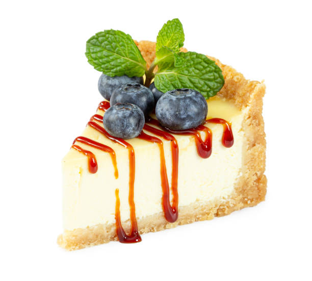 istock Cheesecake with fresh blueberries, caramel syrup and mint leaves isolated on white 1205281586