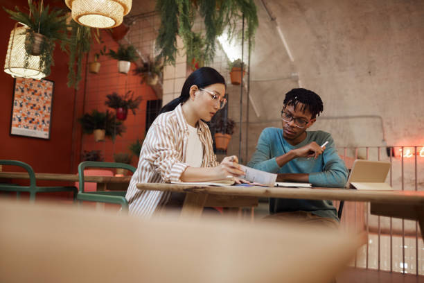 istock Adult Students in Cafe 1205285338