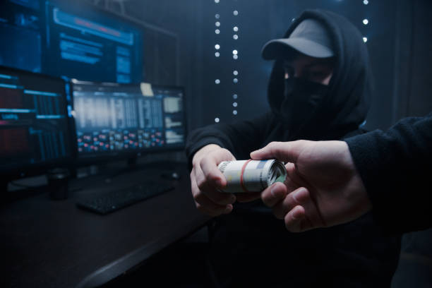 istock The hacker offers his partner to take money from him for developing new viruses and programs for cracking passwords. 1205285821