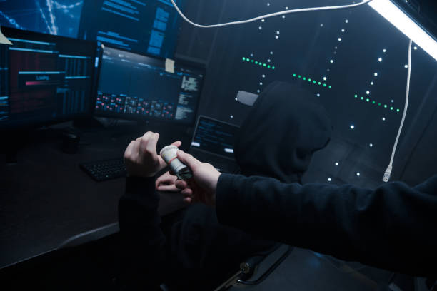 istock The hacker offers his partner to take money from him for developing new viruses and programs for cracking passwords. 1205286148