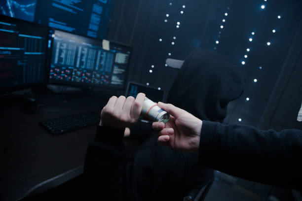 istock The hacker offers his partner to take money from him for developing new viruses and programs for cracking passwords. 1205286695