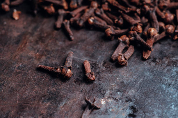 istock Dry cloves spices on the dark rustic background 1205296716