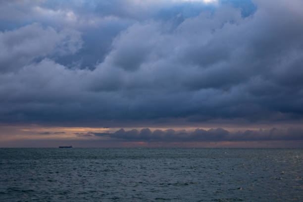 istock blue dark cumulus stormy clouds above the sea 1205296775