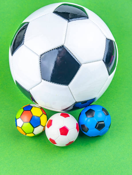 istock Soccer ball on a green background. 1205297296