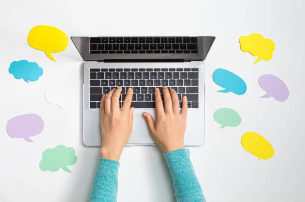 istock Social media concept with message bubbles and a laptop 1205300757
