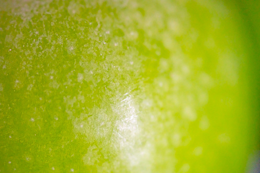 Green apple skin textured background