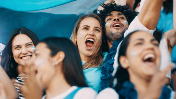 istock Football supporters cheering argentinian national team 1205302715