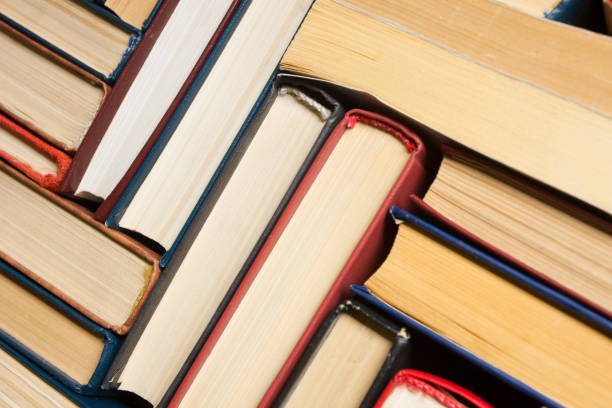 istock Old and used hardback books or text books from above. 1205302889