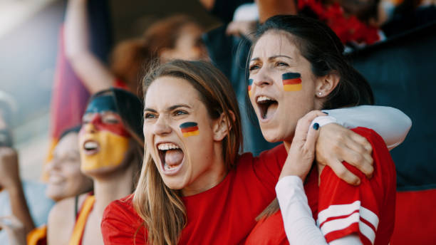 istock German spectators cheering at sports event 1205303074