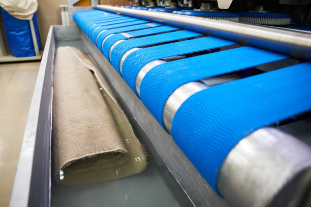 istock Automatic industrial line for washing and cleaning carpets 1205303164