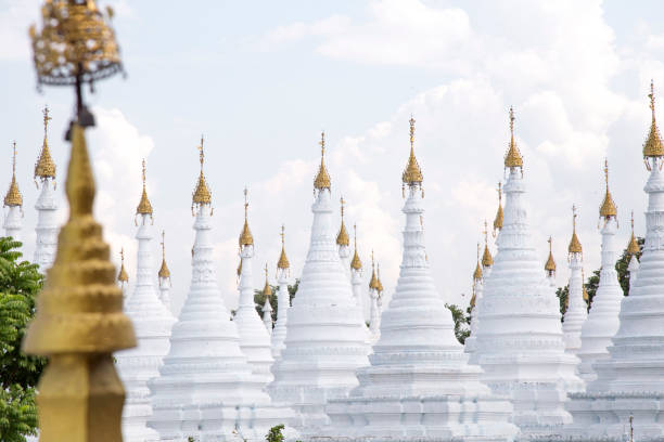 istock White small stupas at Sanda Muni Pagoda, Mandalay 1205304500