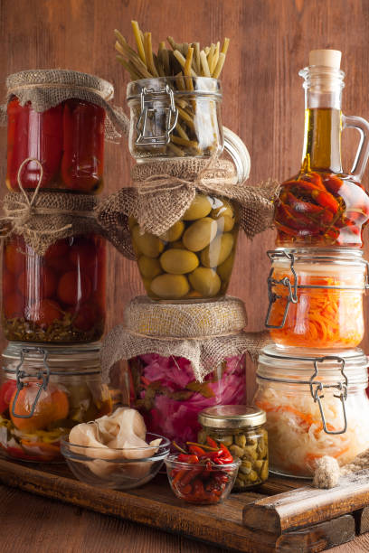 istock Homemade canned pickled and fermented vegetables for long-term storage. 1205308763
