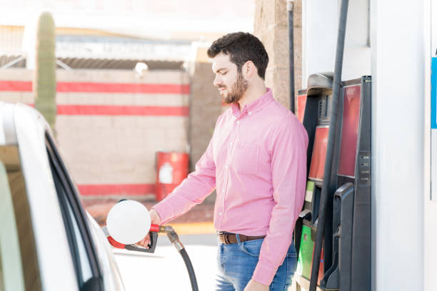 istock Customer Tanking Car At Gas Station 1205310291