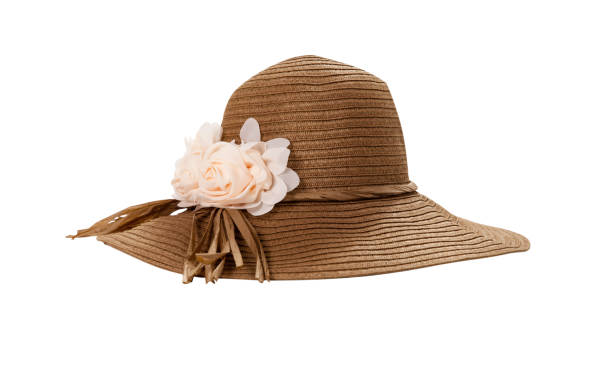 istock Pretty straw hat with ribbon and bow on white background. Beach hat top view isolated 1205312724