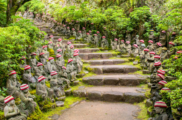 Miyajima Island, Hiroshima, Japan at the buddha lined pathways at Daisho in Temple grounds. stock photo