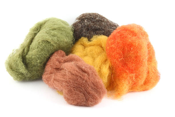 wool tufts before felting stock photo