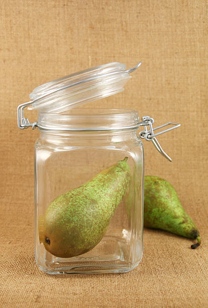 pear in glass  jar stock photo