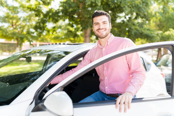 istock Happy Mid Adult Man With New Car 1205314633