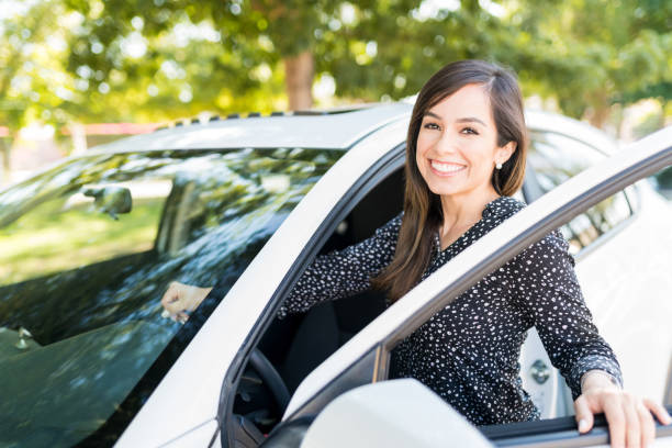 istock Excited Woman With New Car 1205315590