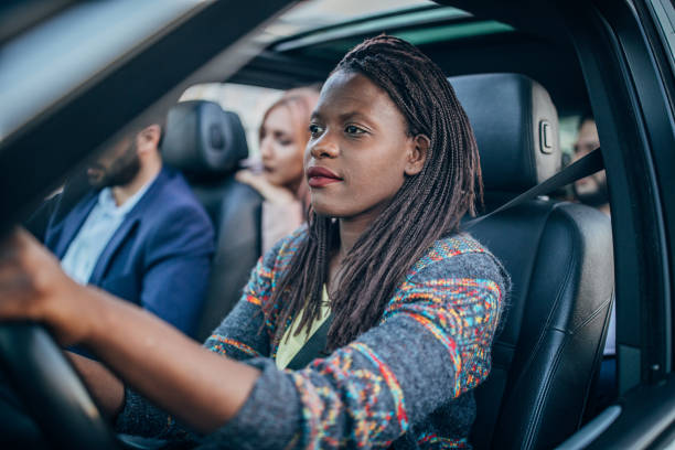 istock Friends traveling by a car 1205324296