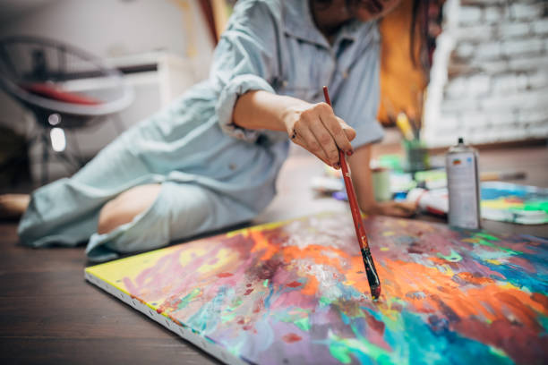 istock Female artist in her studio 1205327228
