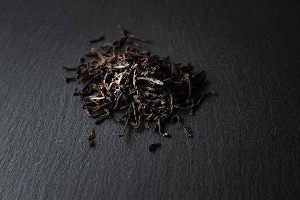 istock dried black tea leaves ready to brew 1205327230