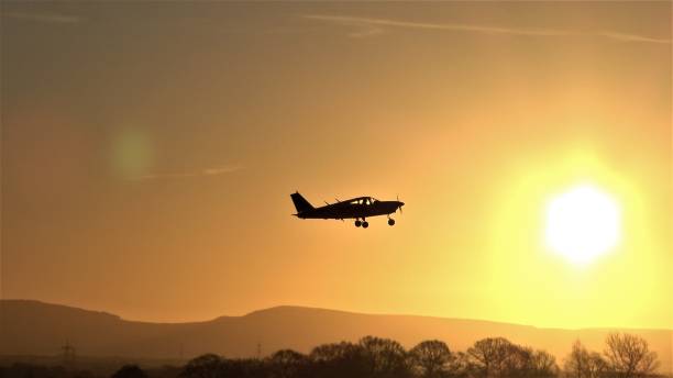 istock Small aircraft sunrise silhouette 1205331586