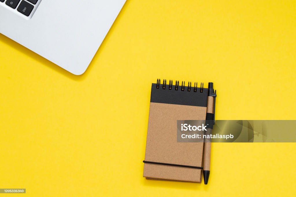 Computer Note Pad Background Notepad And Computer On Yellow Background Stock Photo - Download Image ...