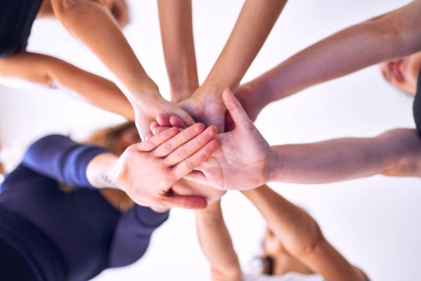 istock Young beautiful sportwomen doing gesture with hands 1205336307