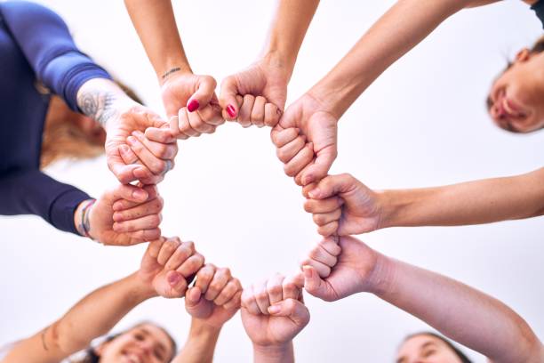 istock Young beautiful sportwomen doing gesture with hands 1205336320
