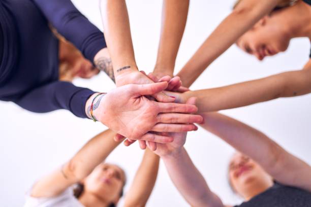 Young beautiful sportwomen doing gesture with hands