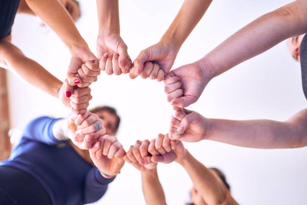 istock Young beautiful sportwomen doing gesture with hands 1205336333