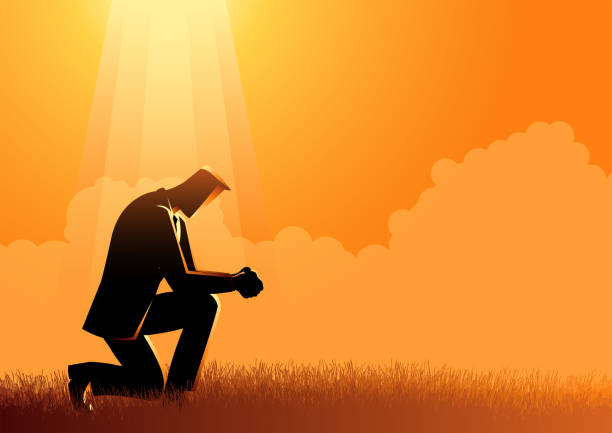 mann betet unter dem licht - praying men god kneeling stock-grafiken, -clipart, -cartoons und -symbole