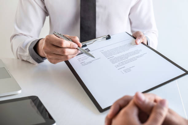 istock Business committee or interviewer consider and asking about profile of candidate, consider resume conducting a job and conversation listen to answers to thought attitude 1205339417