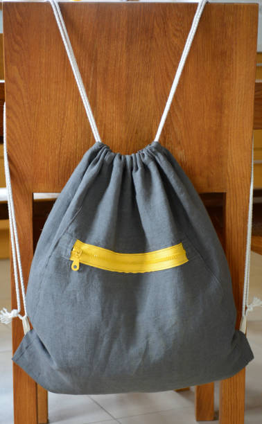 istock Dark grey drawstring backpack for sportswear or shoes. Gym bag 1205345364