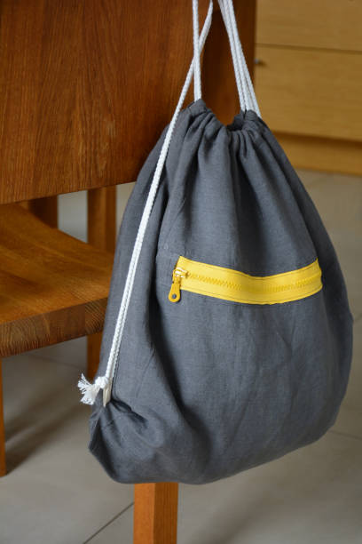 istock Dark grey drawstring backpack for sportswear or shoes. Gym bag 1205345550
