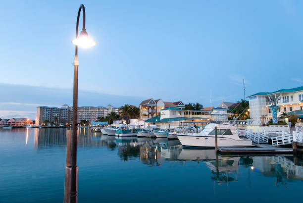 Calm waters of marina at dusk in Lucaya, the suburb of Freeport town on Grand Bahama Island.