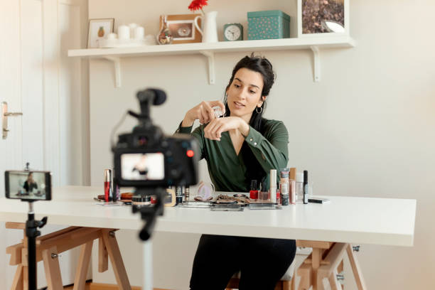 istock Woman Vlogging About Make-up 1205349168