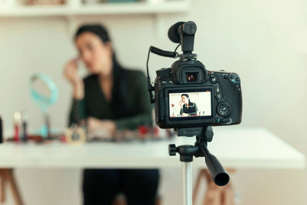 istock Woman Vlogging About Make-up 1205349354