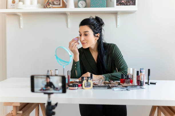 istock Woman Vlogging About Make-up 1205350386