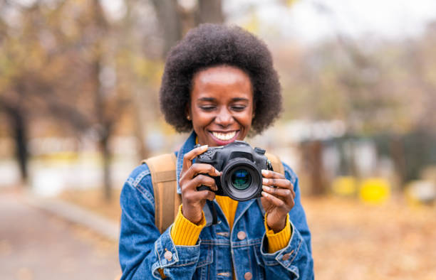 istock Female tourist taking a photo. 1205353549